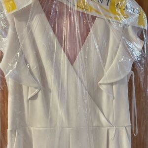 Elegant White TH Ruffle Jumpsuit/Romper